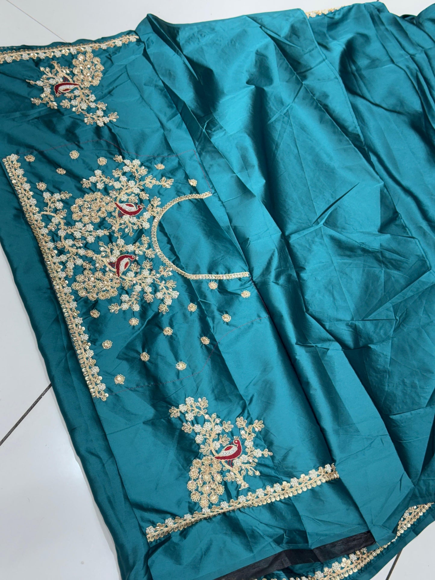 Teal Radiance Pure Satin Silk Saree with Hand-Embellished Peacock Motif Blouse