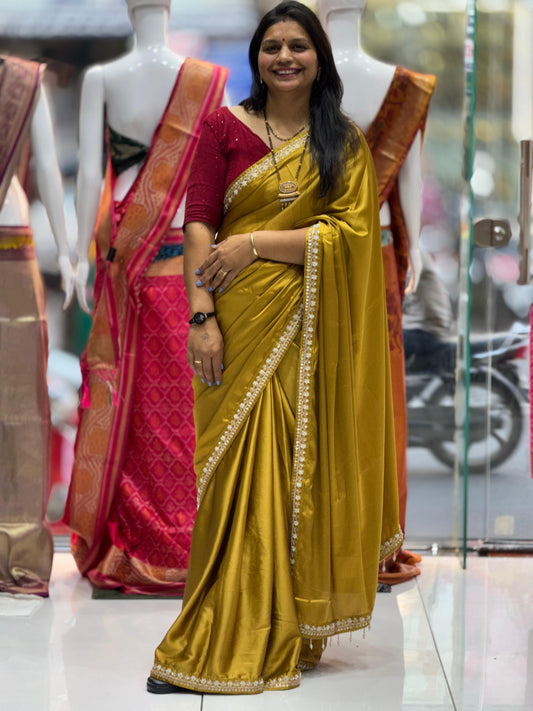 Teal Radiance Pure Satin Silk Saree with Hand-Embellished Peacock Motif Blouse