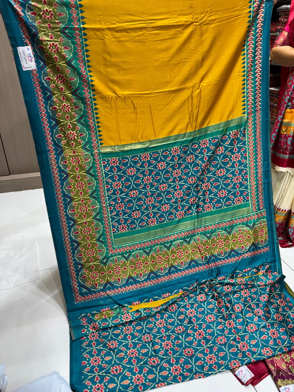 Vipul Premium Patola Print Soft Muga Silk Saree with Contrast Border