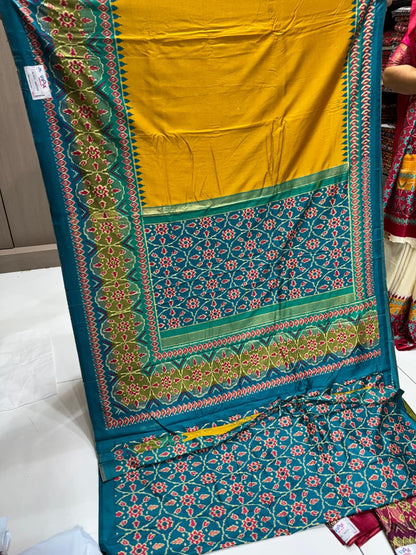 Vipul Premium Patola Print Soft Muga Silk Saree with Contrast Border