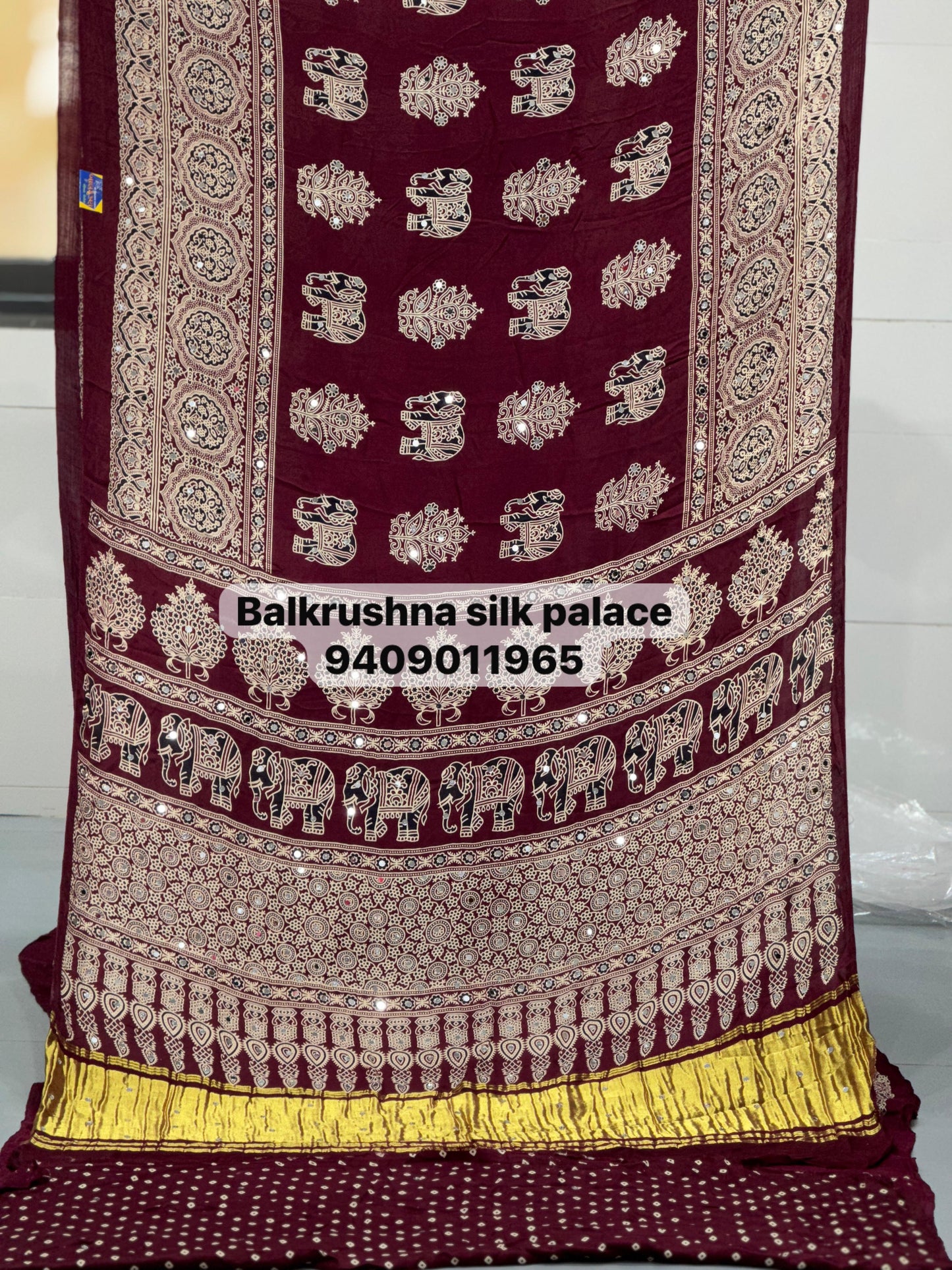 Traditional Ajrakh Printed Saree with Zari Pallu & Elephant Motifs | Mirror Work