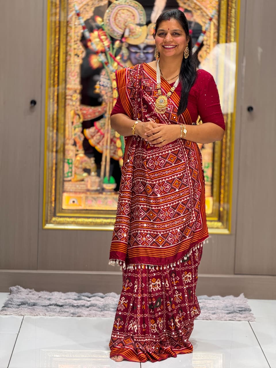Maroon Festive Patola Saree with Mirror Work & Tassels