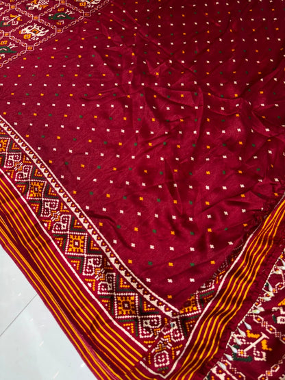 Maroon Festive Patola Saree with Mirror Work & Tassels